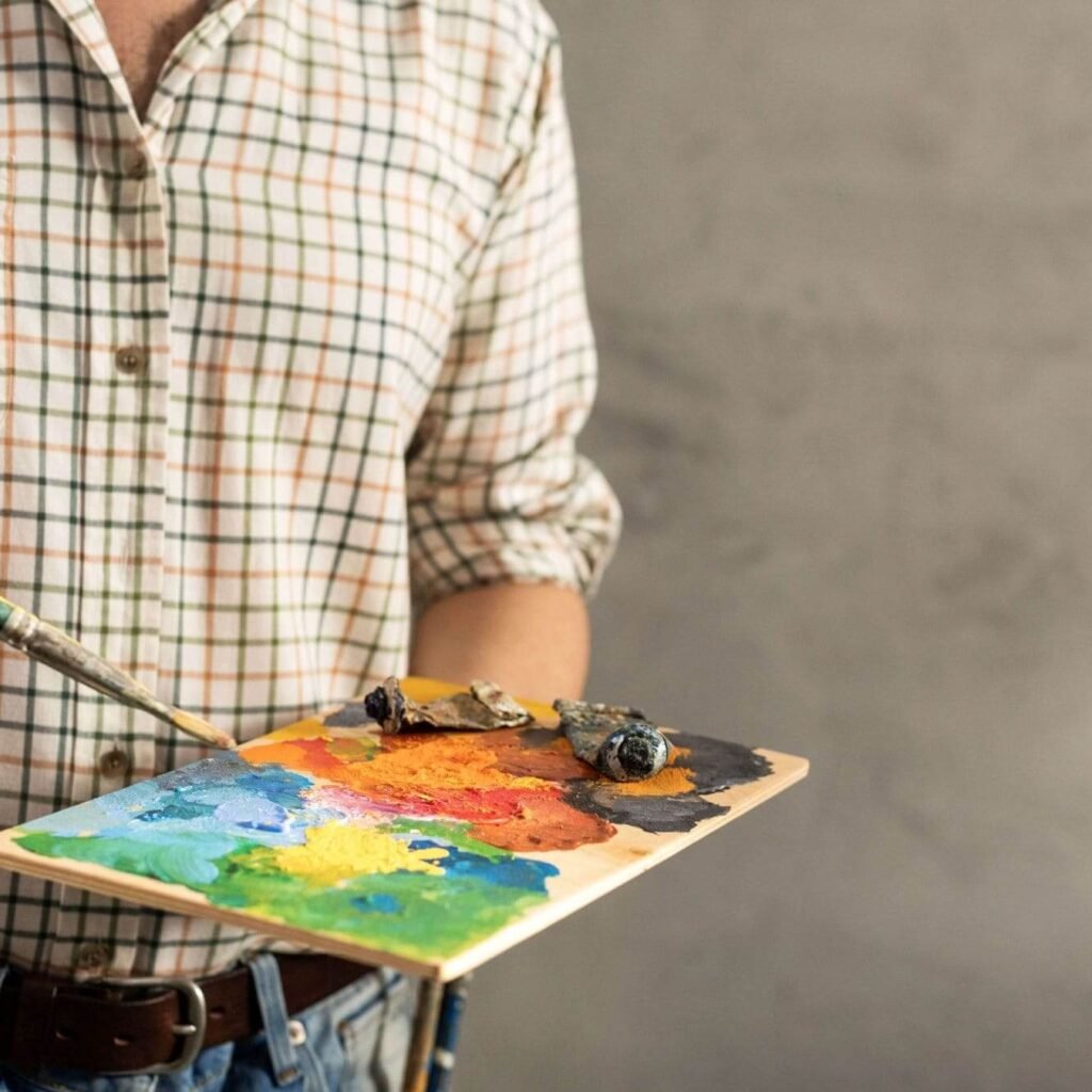 male artist holding palette and paintbrush man art mal7h2m